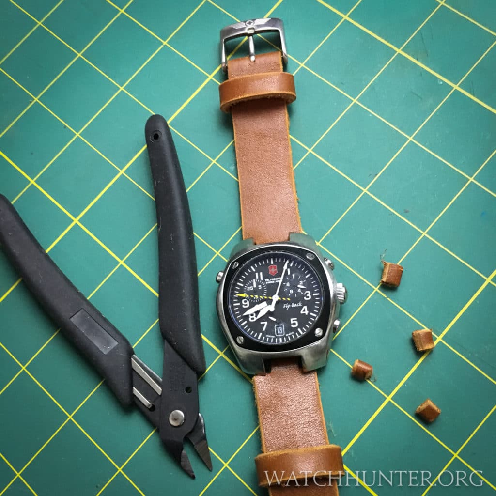 Small snips cleanly cut the leather watch band for the Victorinox Swiss Army Hunter Mach 2 Chronograph.