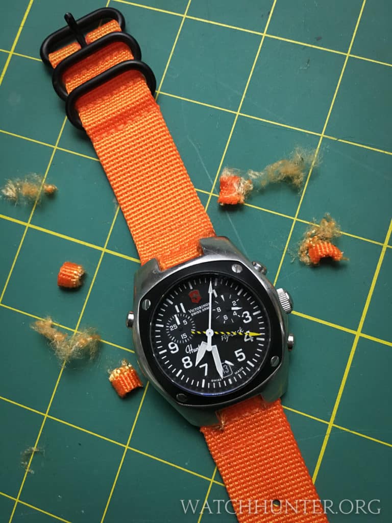 The watch band's PVD hardware ties in with the Hunter Mach 2's black dial and bezel.