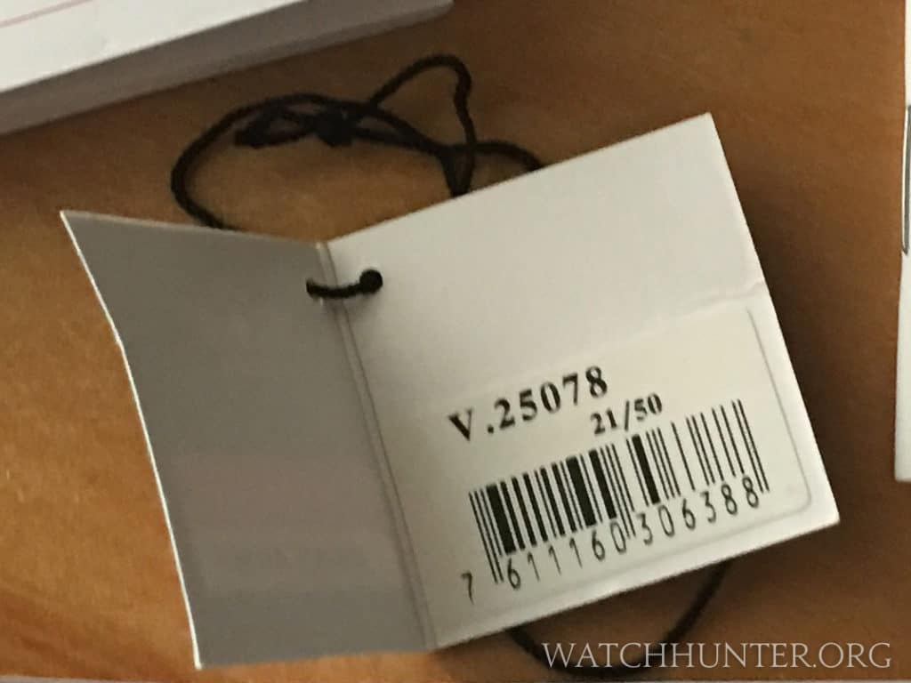 This card shows the model number of the watch V 25078, and its number in the series (21/50).