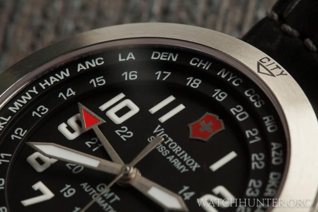 The 24 hour military scale and well known city abbreviations on inner bezel