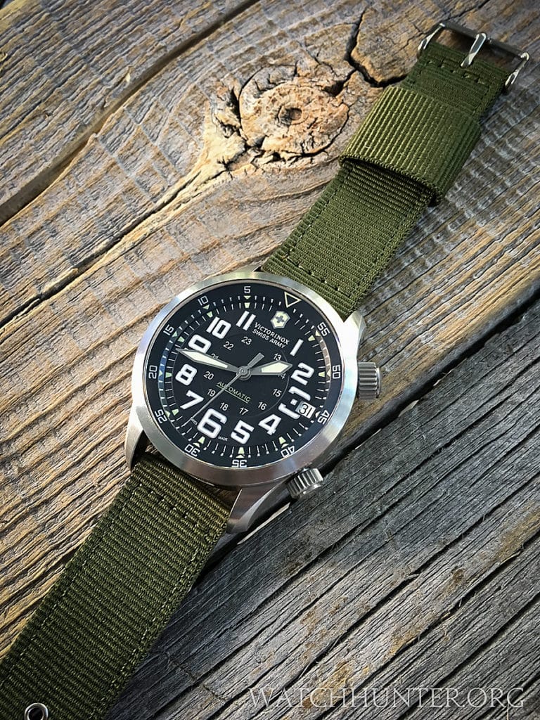 OD green picks up the greenish tint of the dial text and lume.