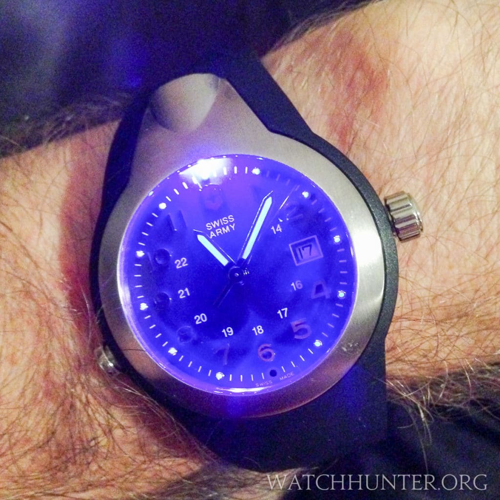 A UV light illuminates the dial and charges the lume on the hands and hour markers on the first generation Night Vision watch